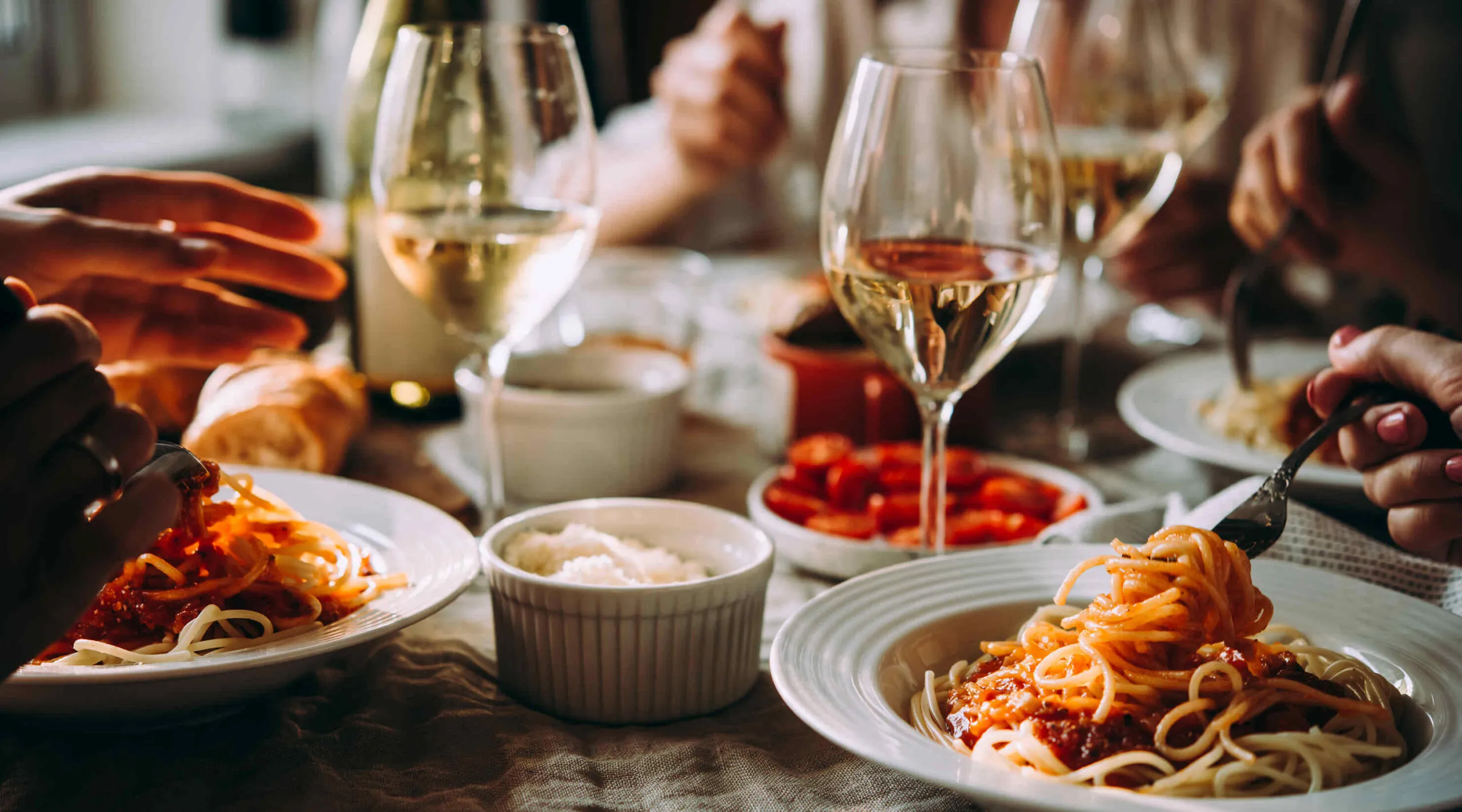 Shared dishes on a restaurant table at service
